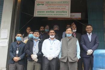 Distribution of Relief package from Putalisadak Branch.